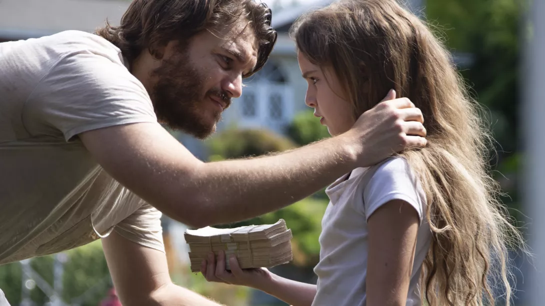 A father (Emilie Hirsch) puts his hand on the shoulder of his disgruntled young daughter (played by Lexi Kolker) in an official still image from FREAKS from Well Go USA